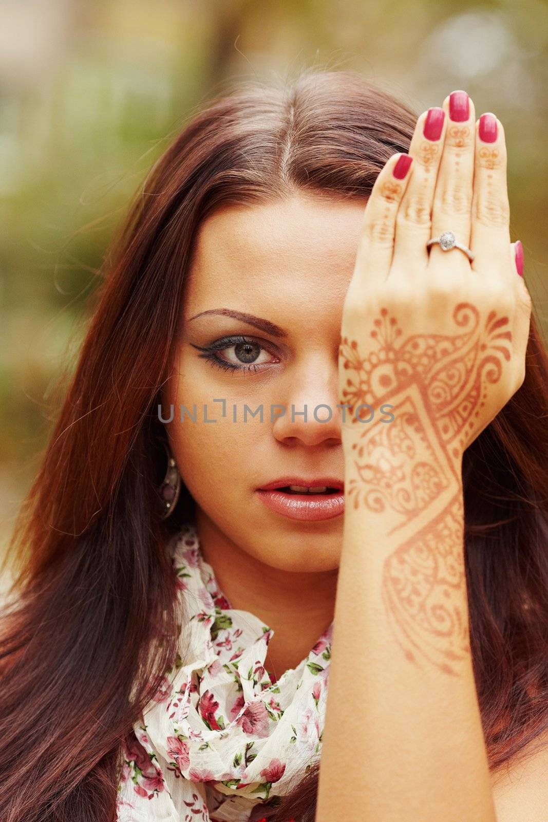 Girl with hands painted Mehandi. Picture by a henna