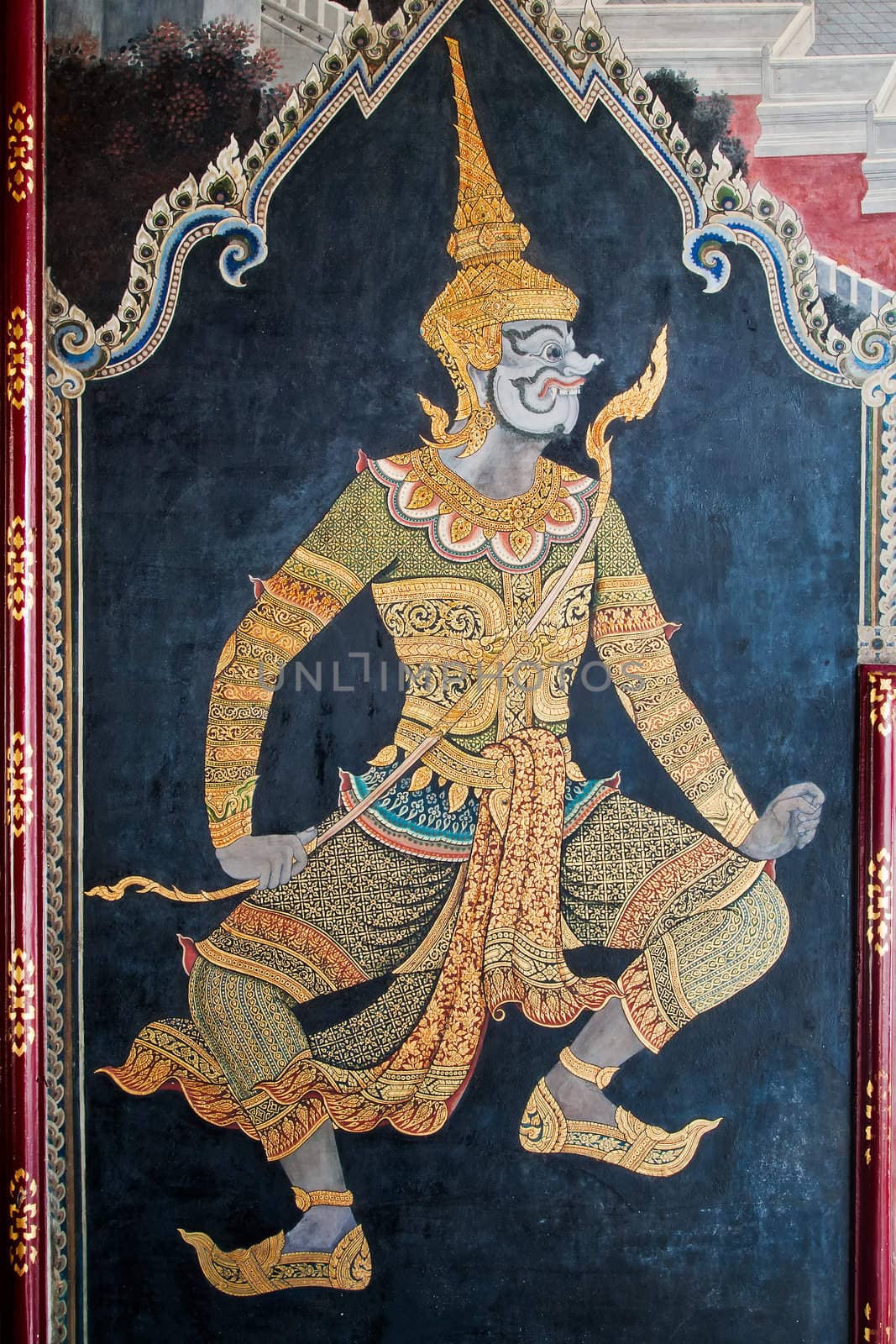 Thai art gold painting on wall by nuttakit