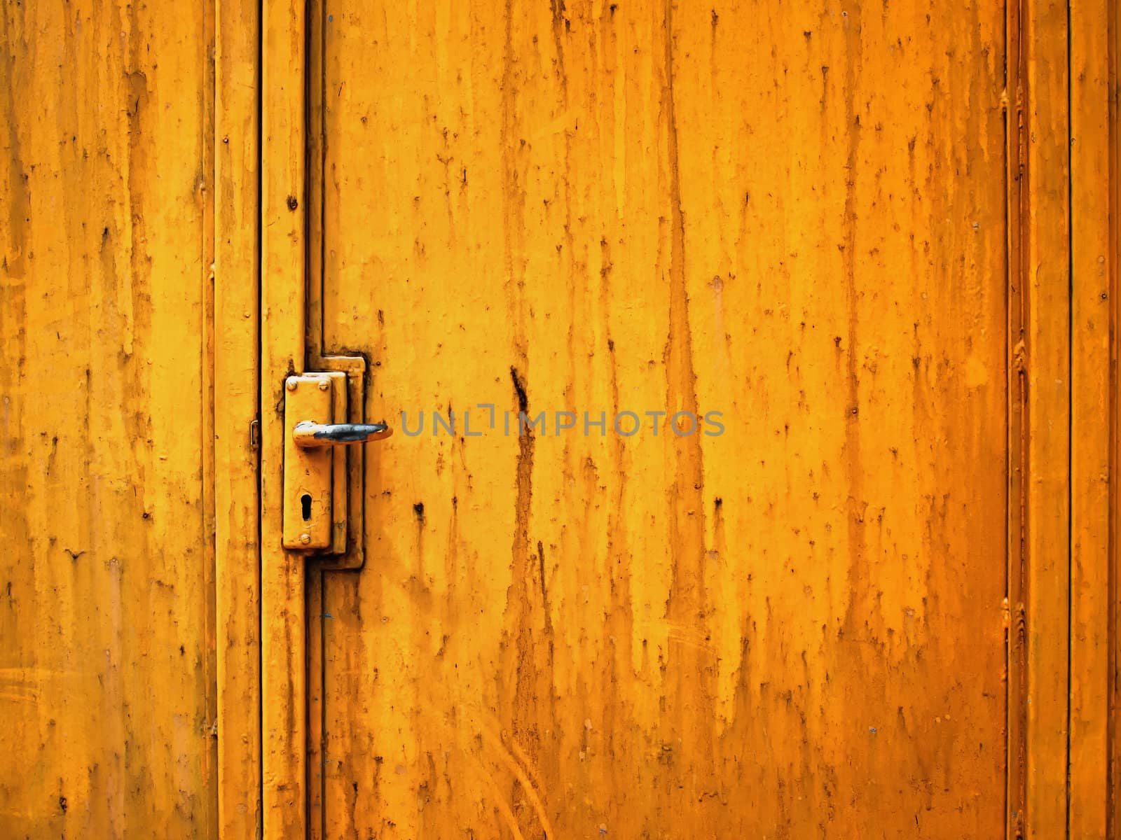 steel door painted Orange color by nuttakit