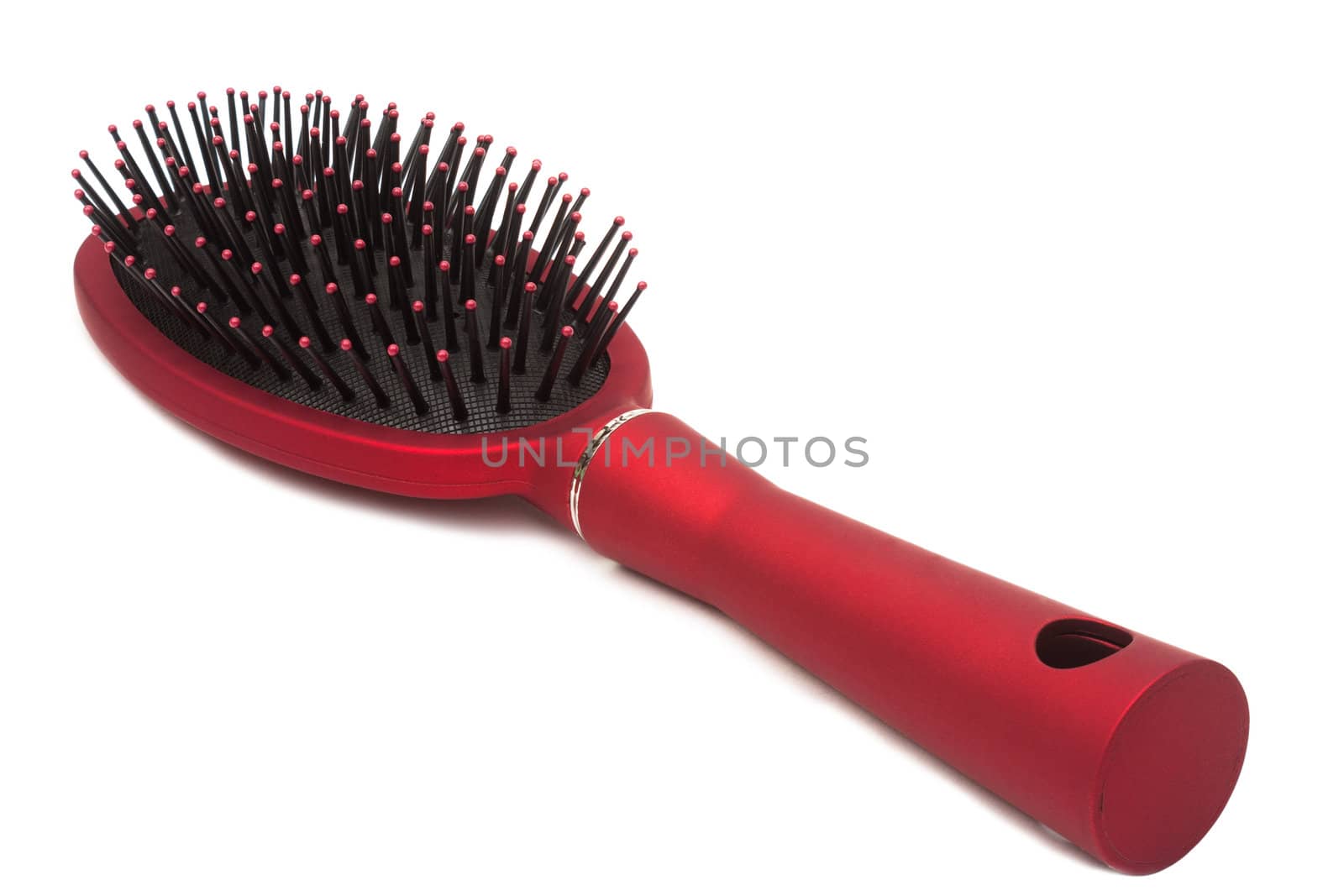 Red hairbrush - it is isolated on a white background