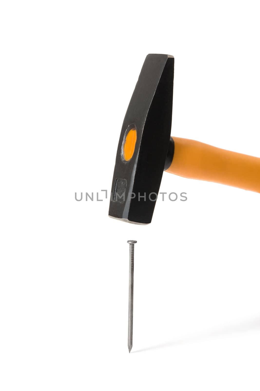 Hammer and nail - it is isolated on a white background
