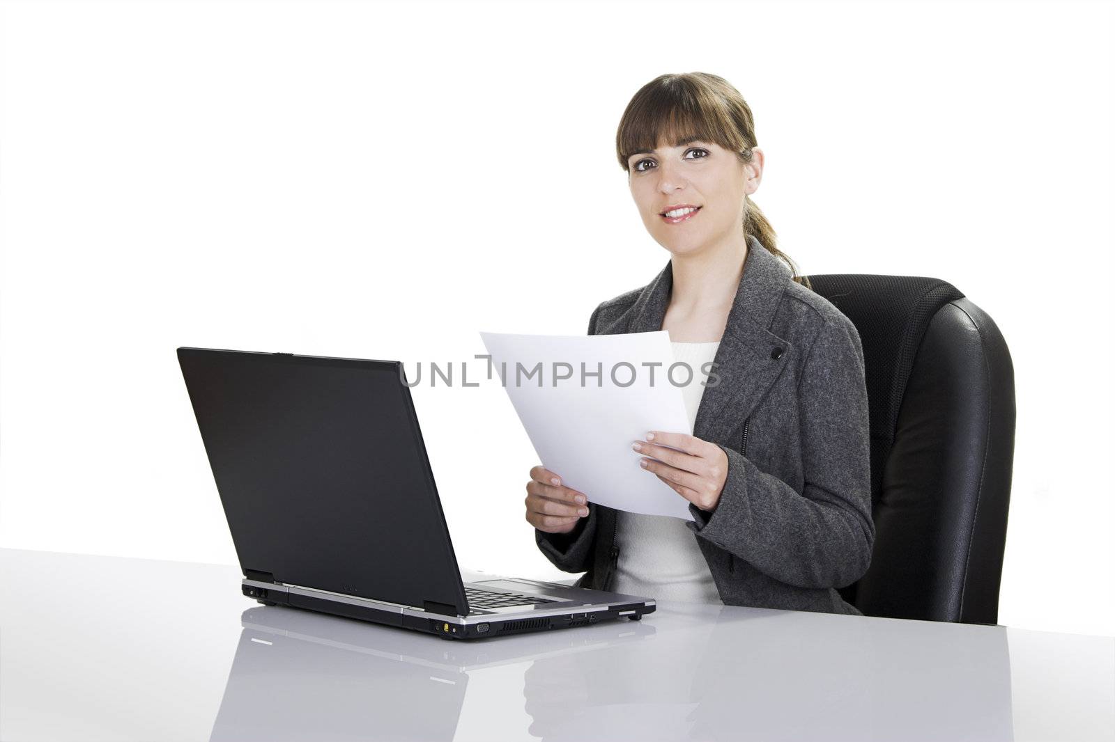 Beautiful business woman working with a laptop on a white background