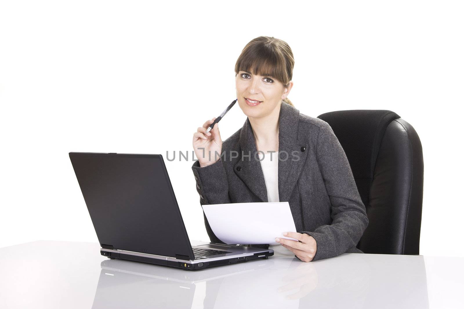 Beautiful business woman working with a laptop on a white background