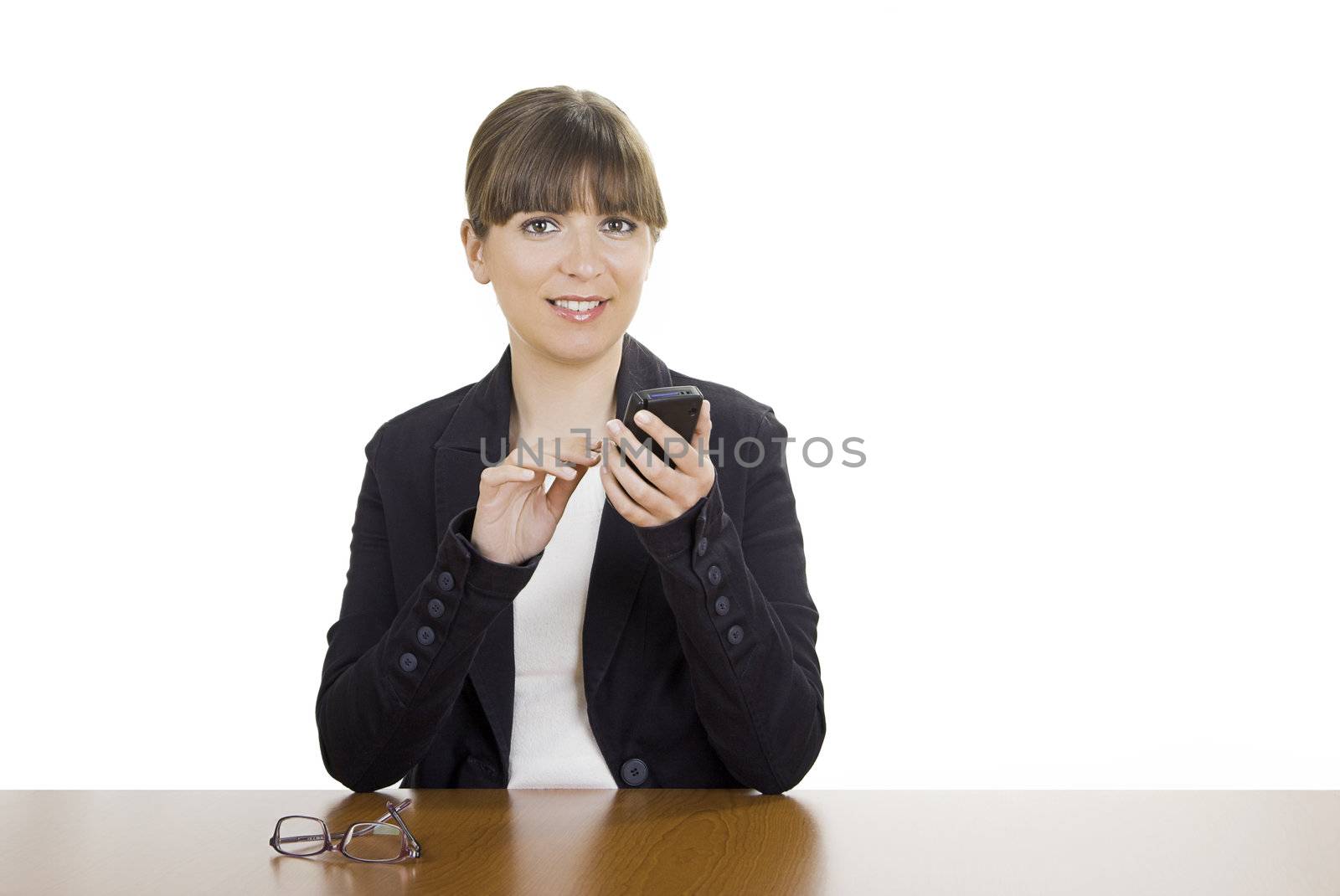Beautiful business woman with a Pda over a white background