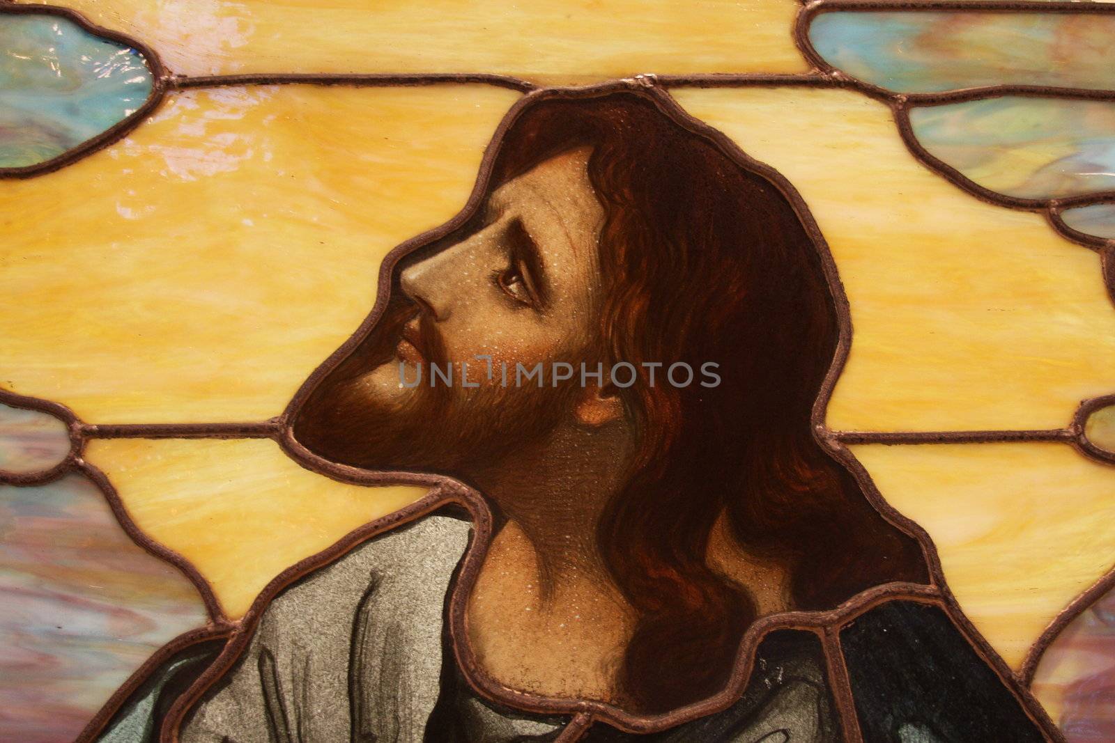 jesus portrait is sculpted in stained glass