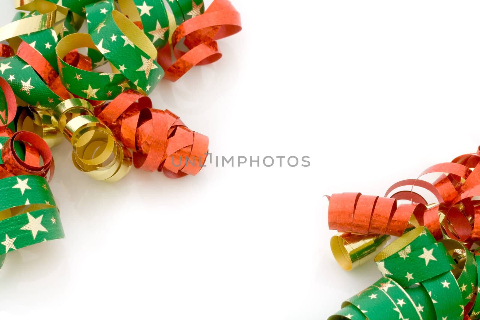 Red, golden and starry Christmas ribbons on white