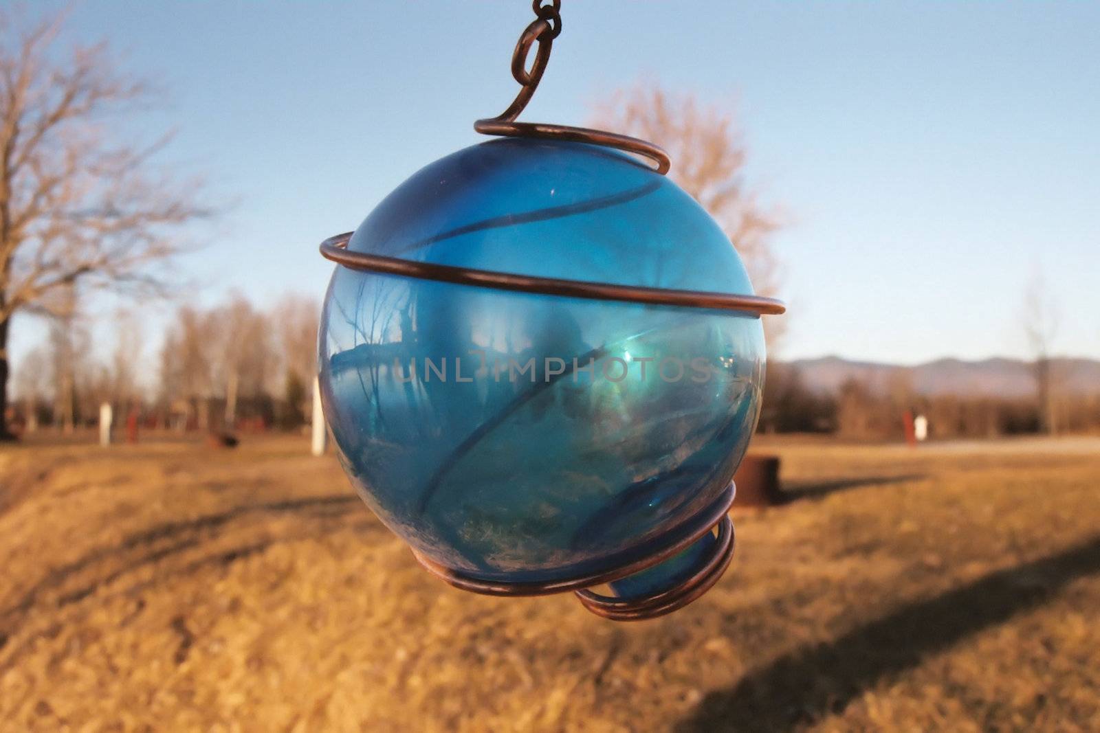 A hanging decorative blue ball