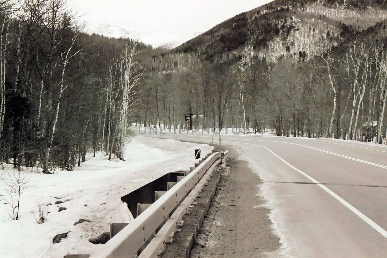 A rural highway during the winter time
