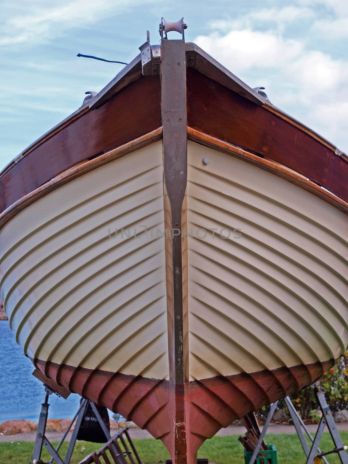 Prow of a wooden yacht boat by Ronyzmbow