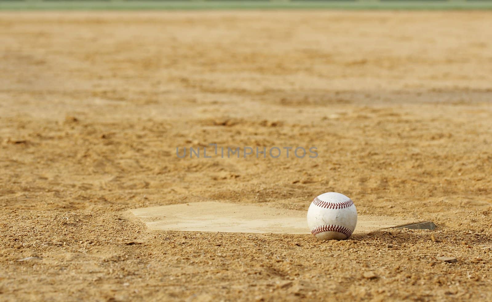 one baseball on infield of sport field