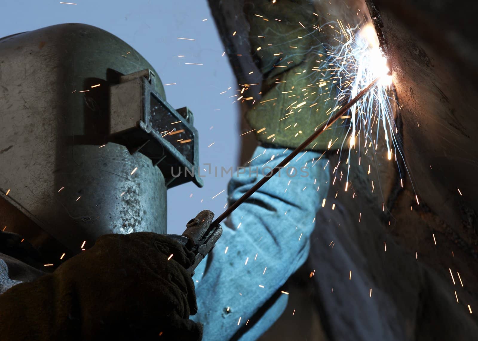a arc welder busy at work