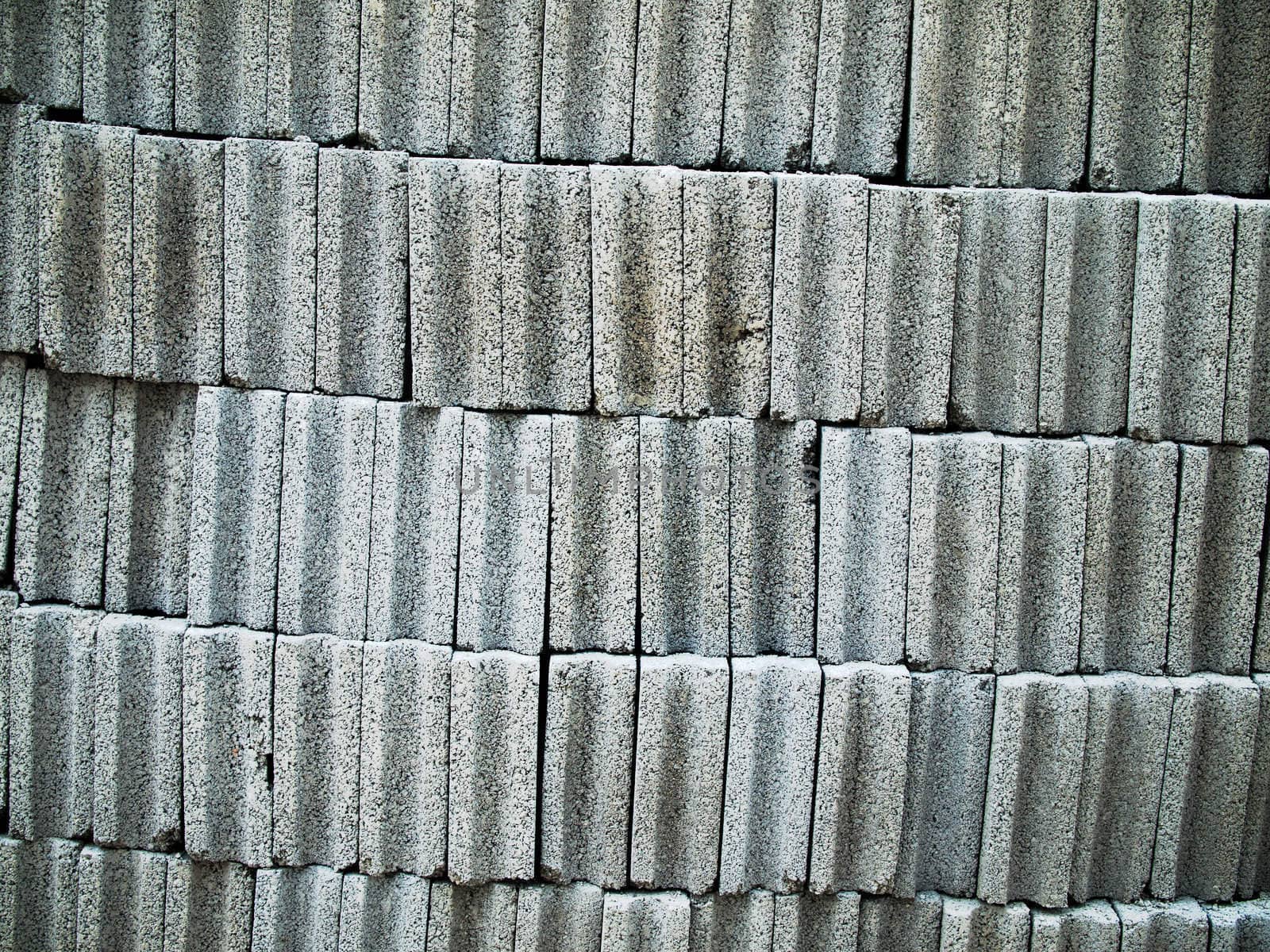 Gray concrete brick block by nuttakit