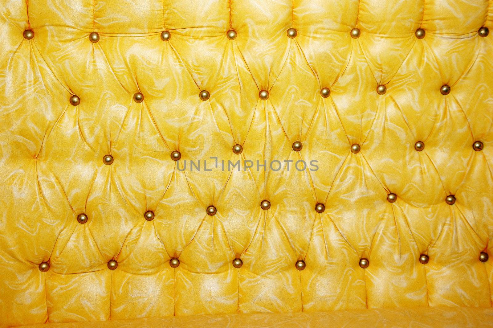 texture and pattern of yellow leather seat upholstery