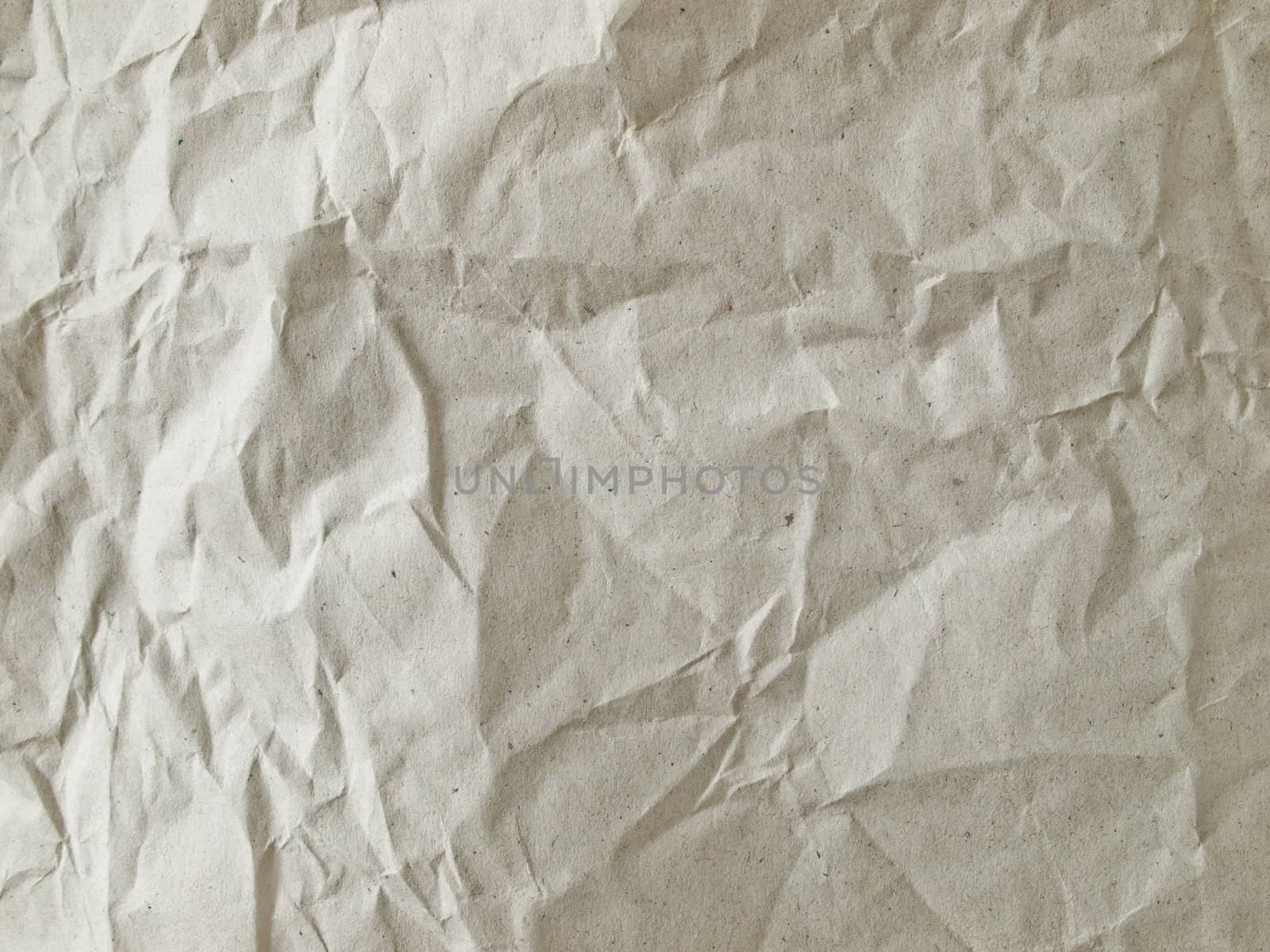 Texture of light brown crumpled paper for background