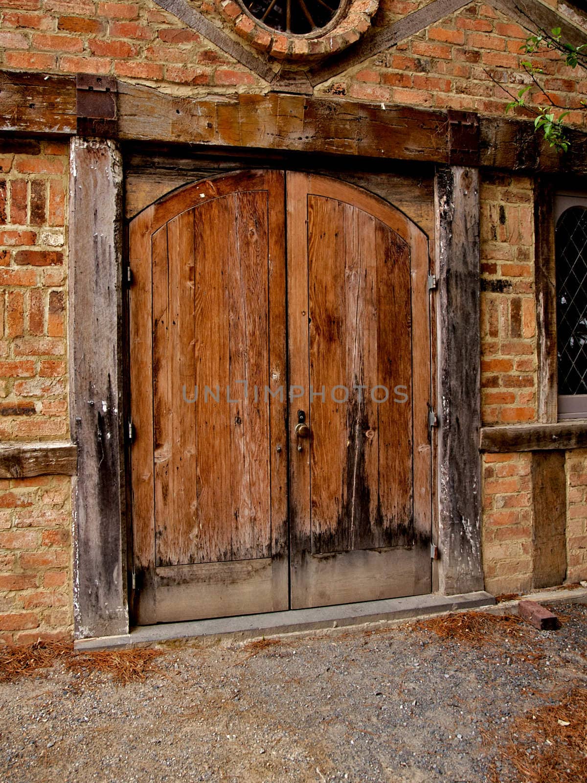 Old wooden historic door, part of a building