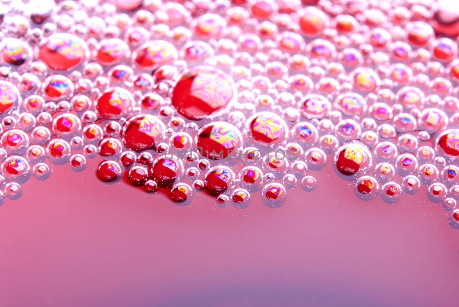 Bubbles of red wine from the different foreshortening  in glass