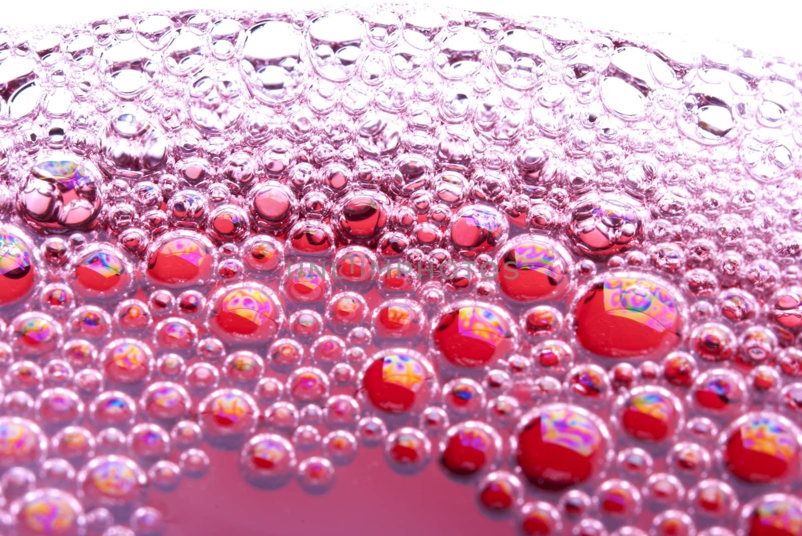 Bubbles of red wine from the different foreshortening  in glass
