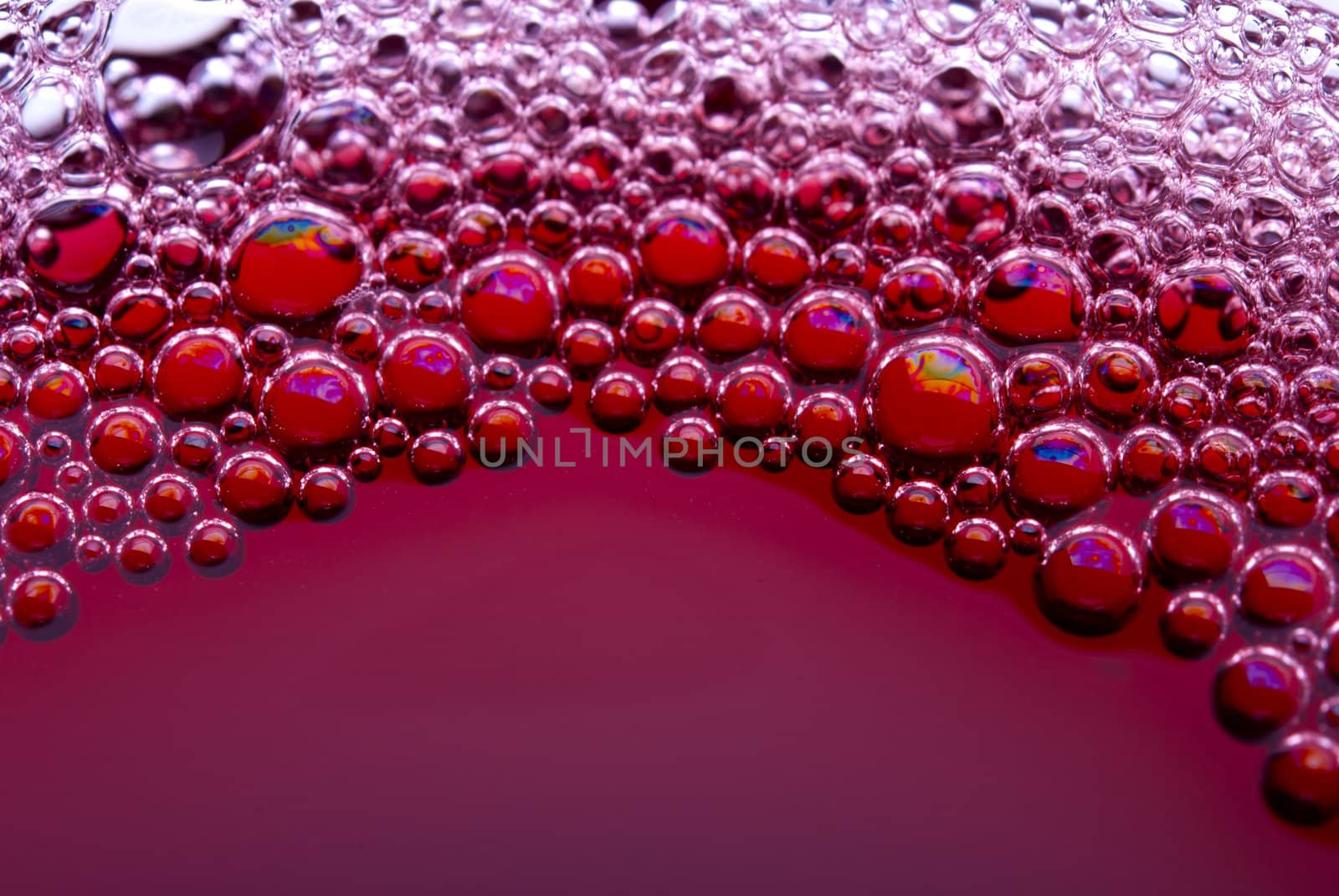 Bubbles of red wine from the different foreshortening  in glass