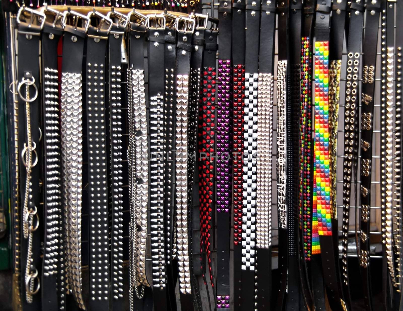 Number of studded belts in different shapes and colors