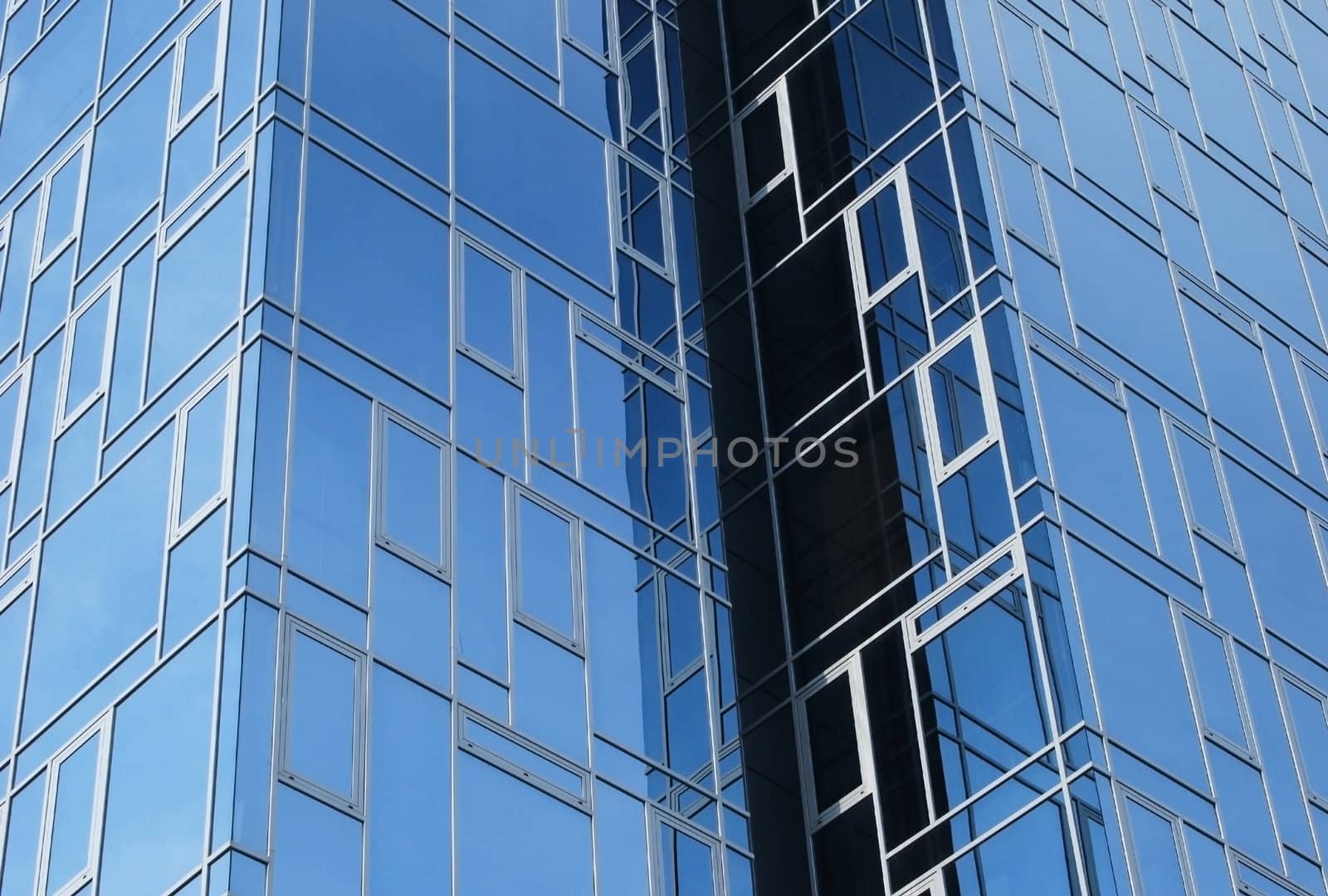 Modern office building middle blue glass floors