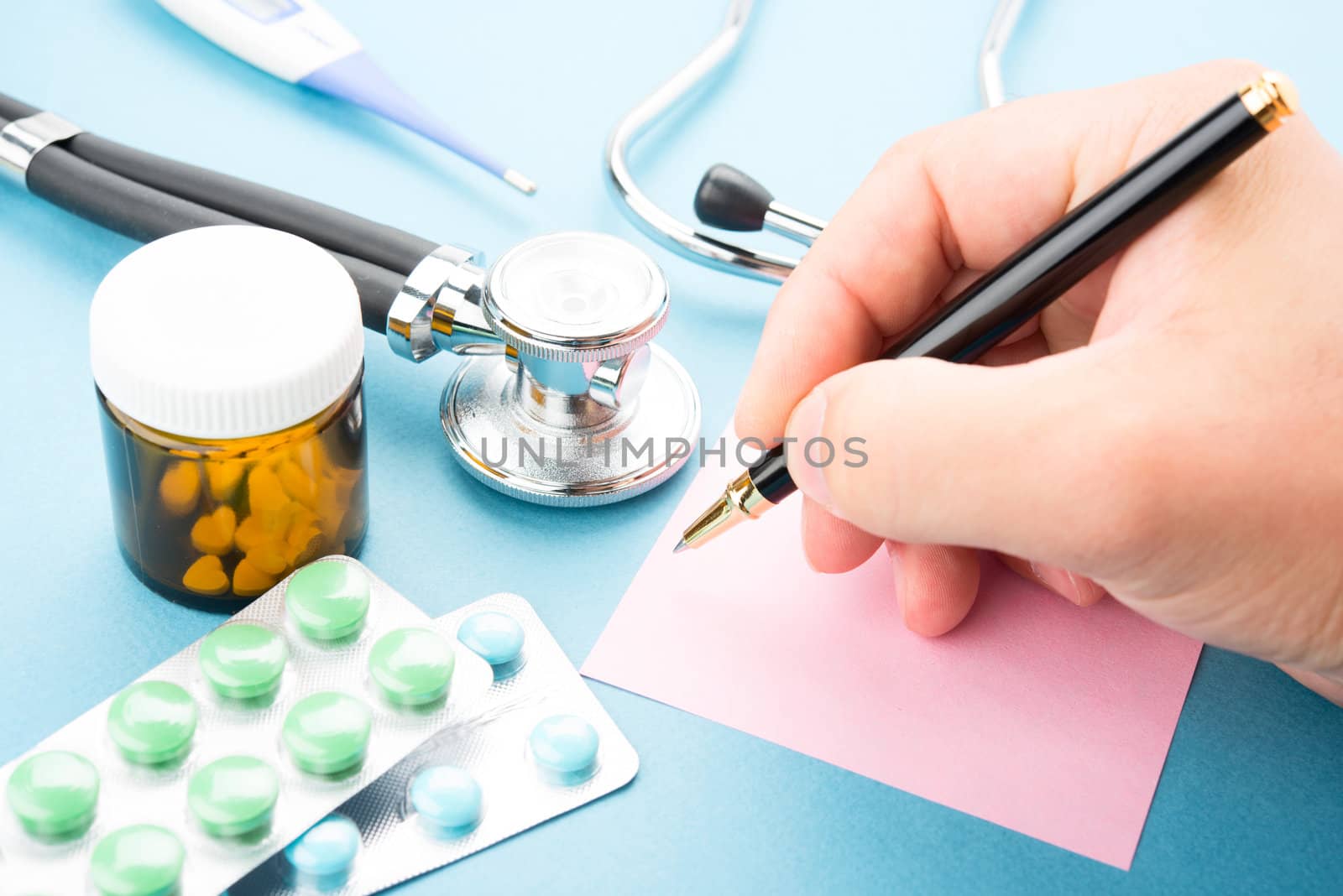 Doctor writing a prescription