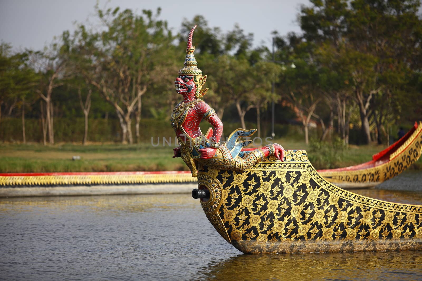 Red Garuda warship floats on the river 