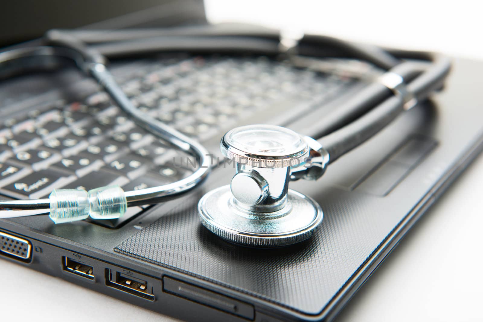 Concept of diagnostic. Stethoscope and laptop