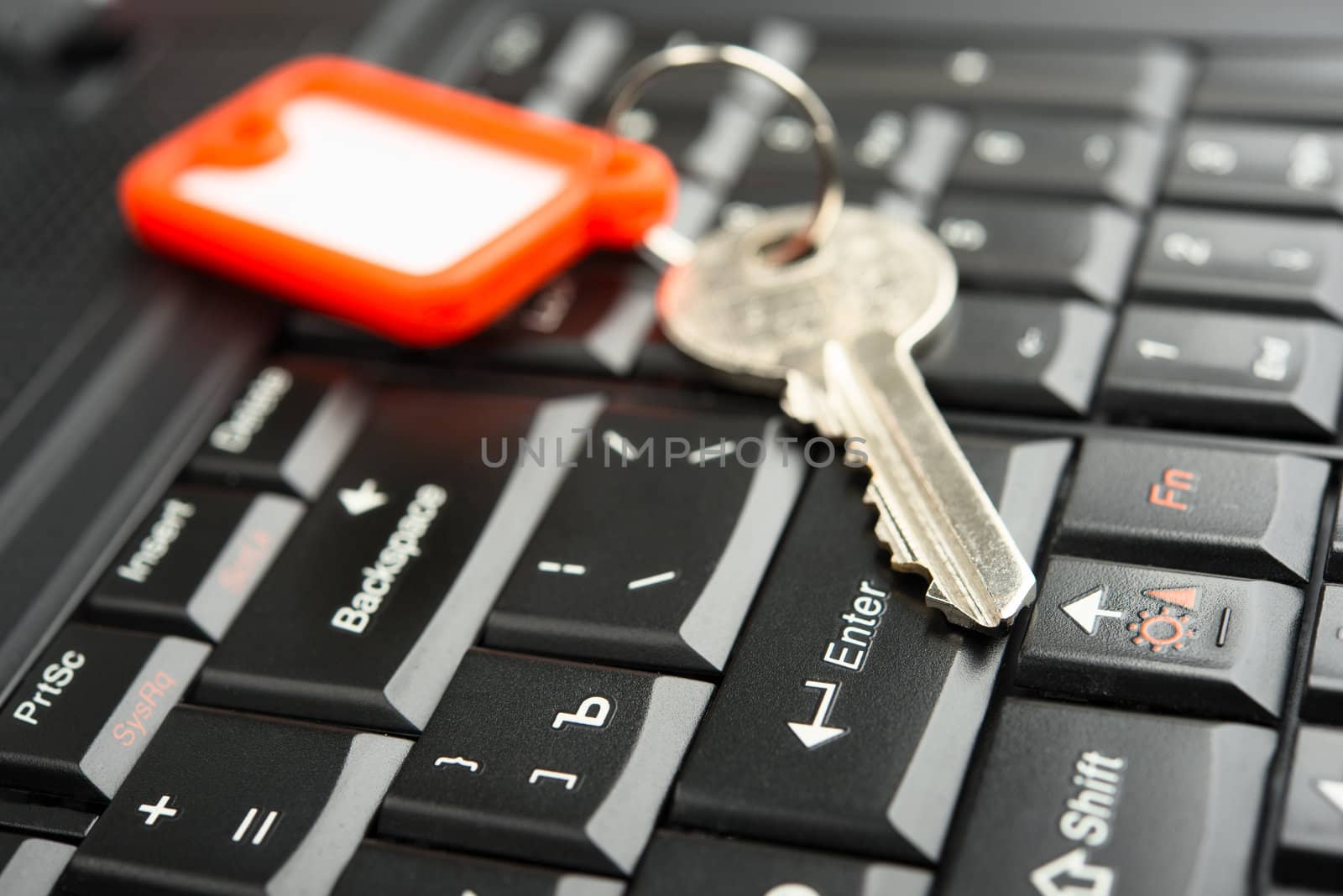 key on laptop keyboard with shallow depth of field