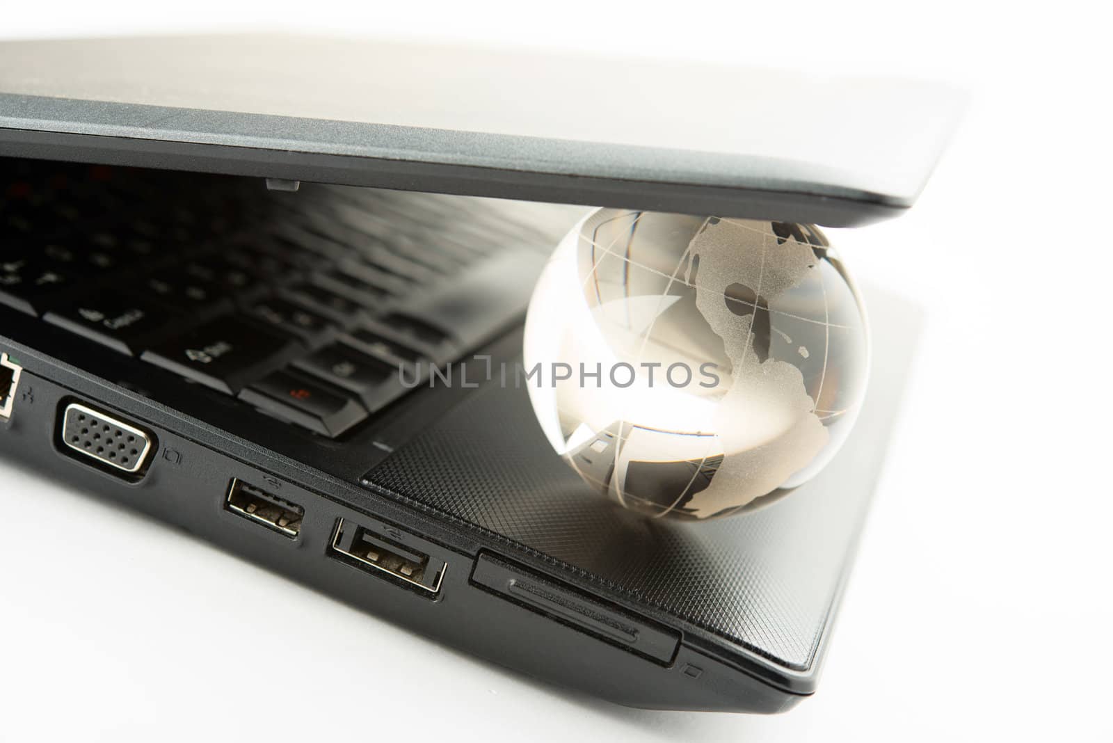 globe on a laptop keyboard