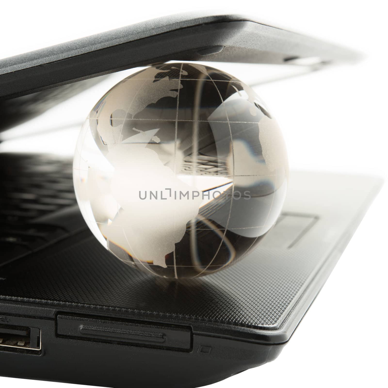 globe on a laptop keyboard