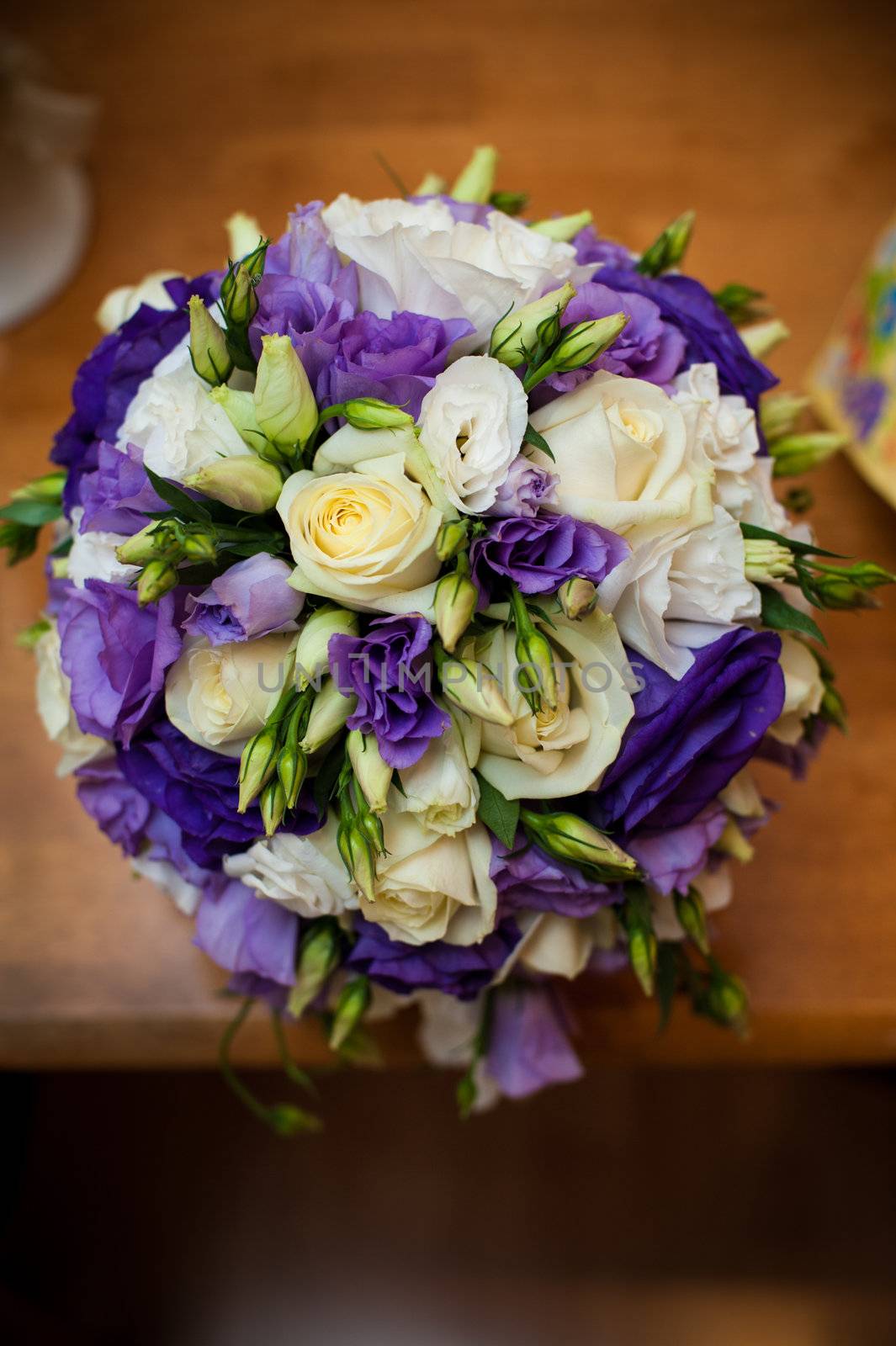 Wedding bouquet. Bridal bouquet lying on her lap.