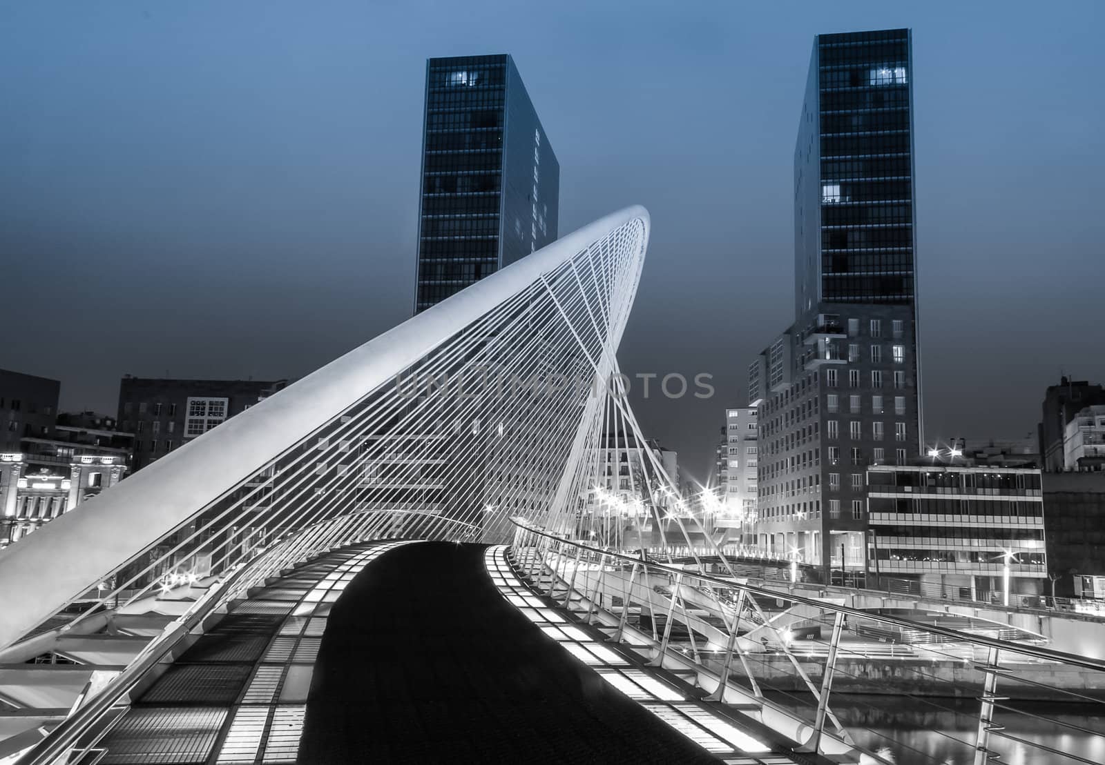Nightview of Zubizuri bridge and Isozaki towers in Bilbao, Spain by doble.d