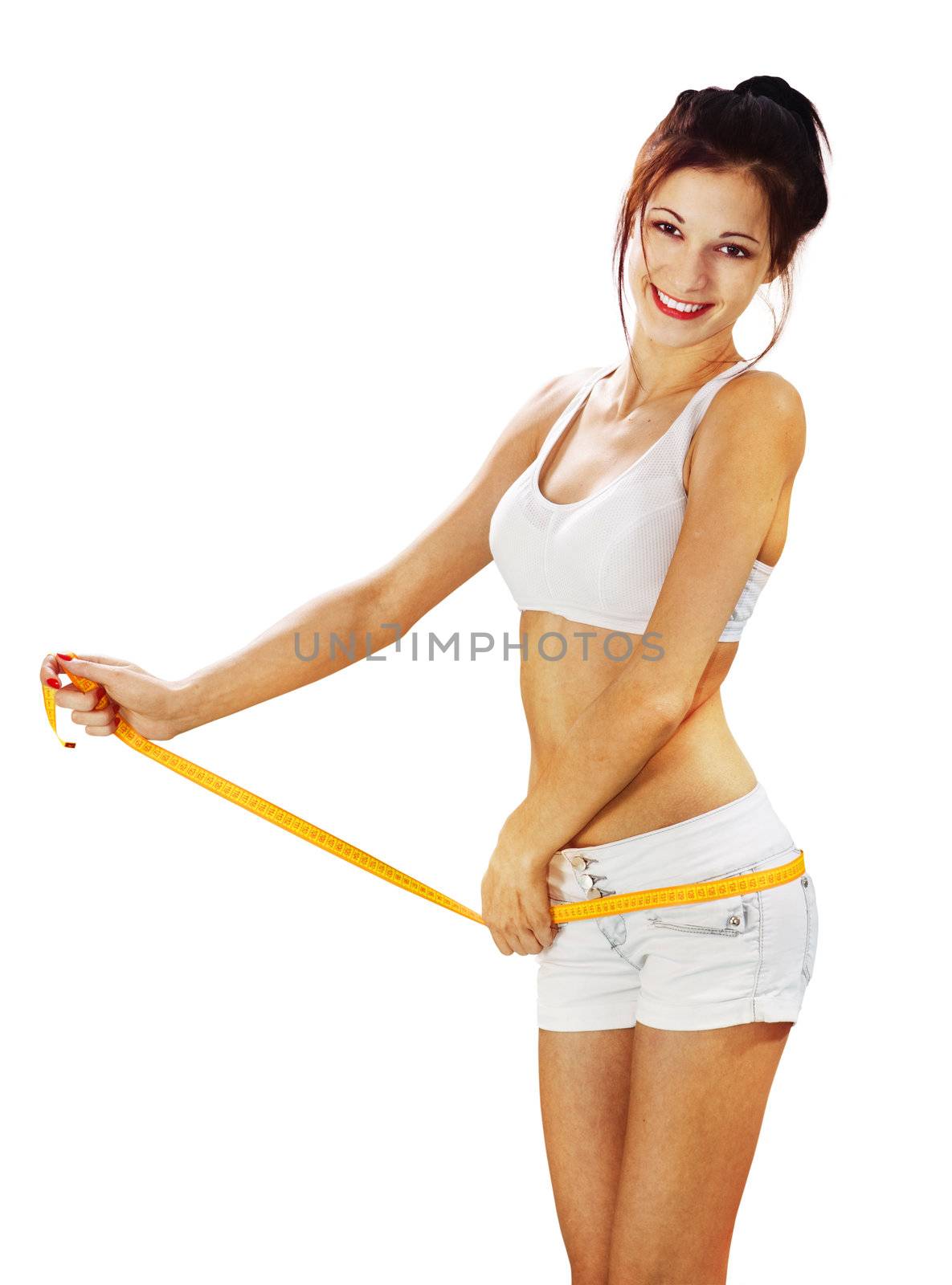 Young happy woman measures her waist on white background with path