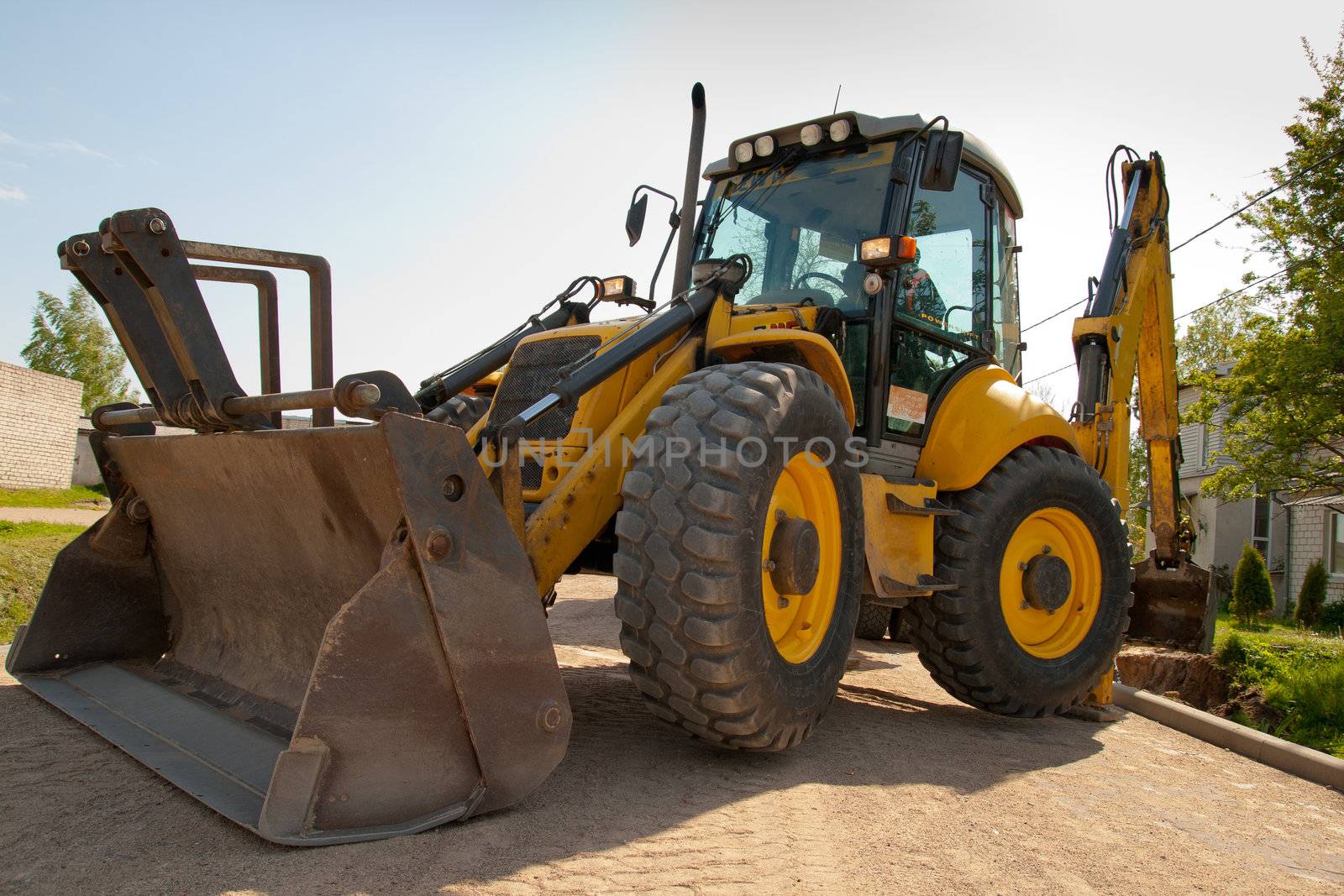 excavator on the new street