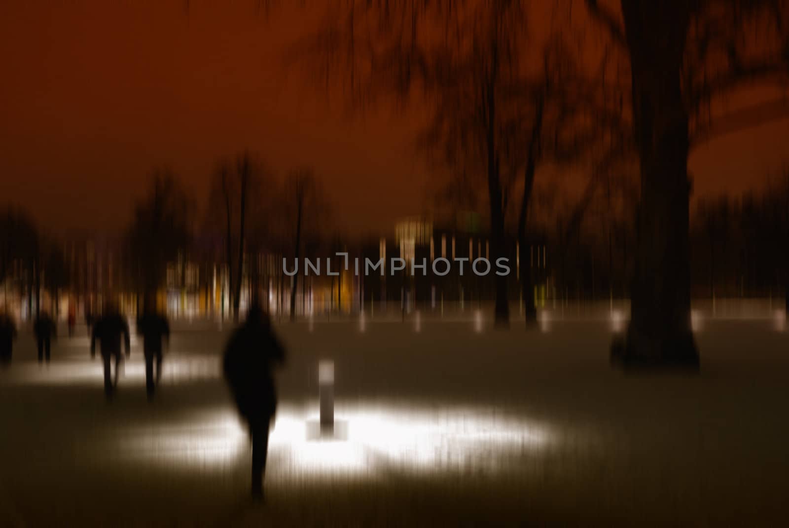 Conceptual capture - stormy night in the park after snow.