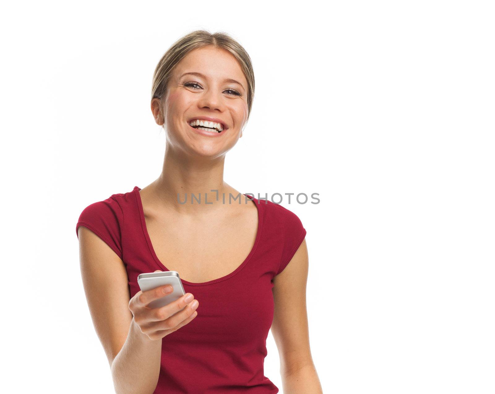 Smiling woman with her smartphone, on white