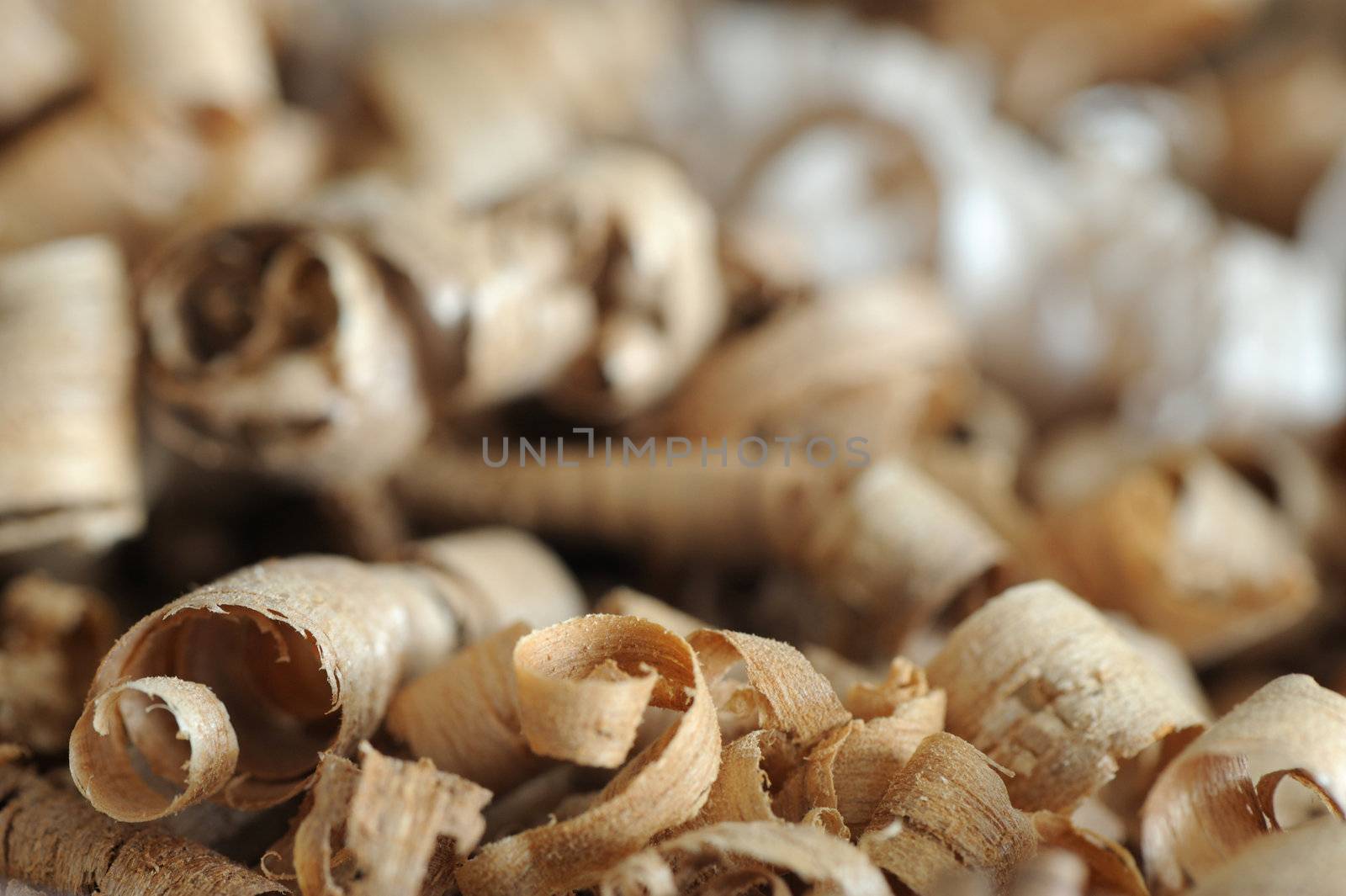 close up of a pile of wood chips, shallow dof by stokkete