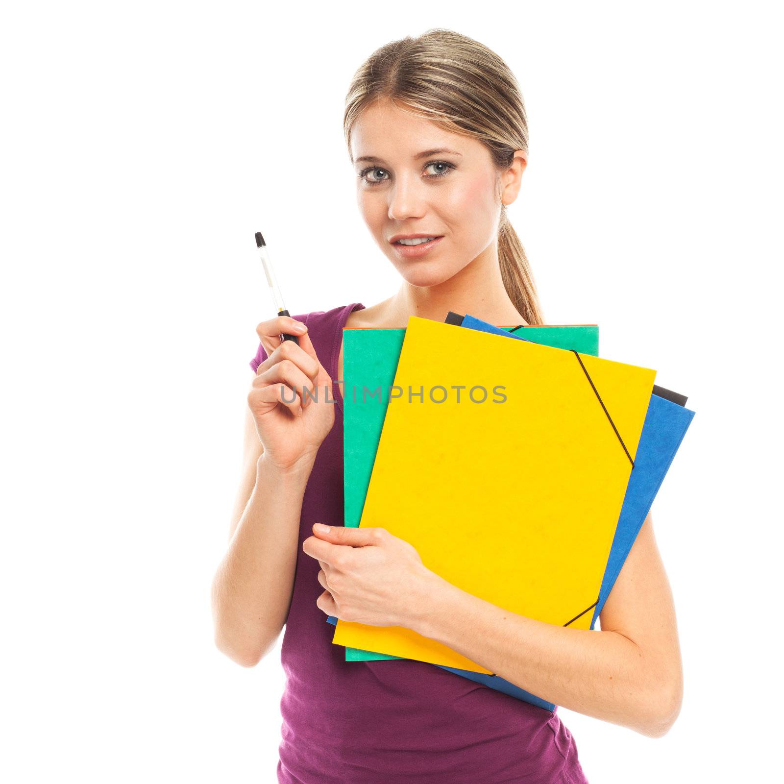 Young blond woman holding folders and pen, on white