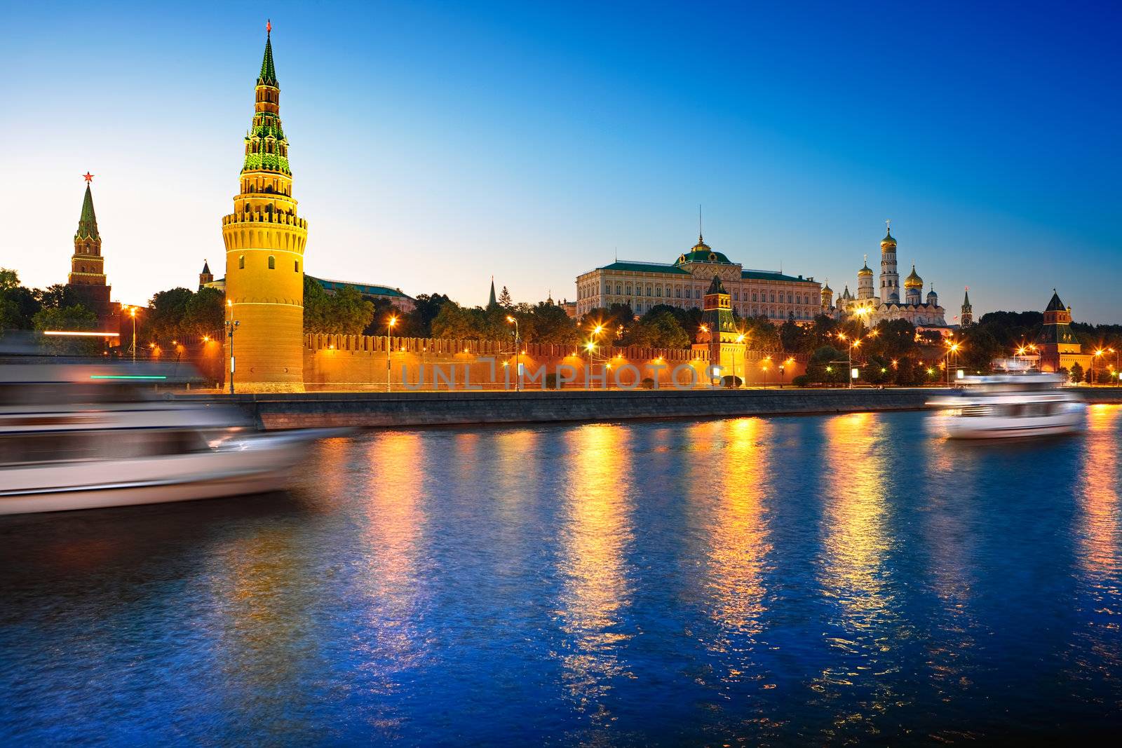 View of the Moscow Kremlin and Moskva river at night. by vladimir_sklyarov