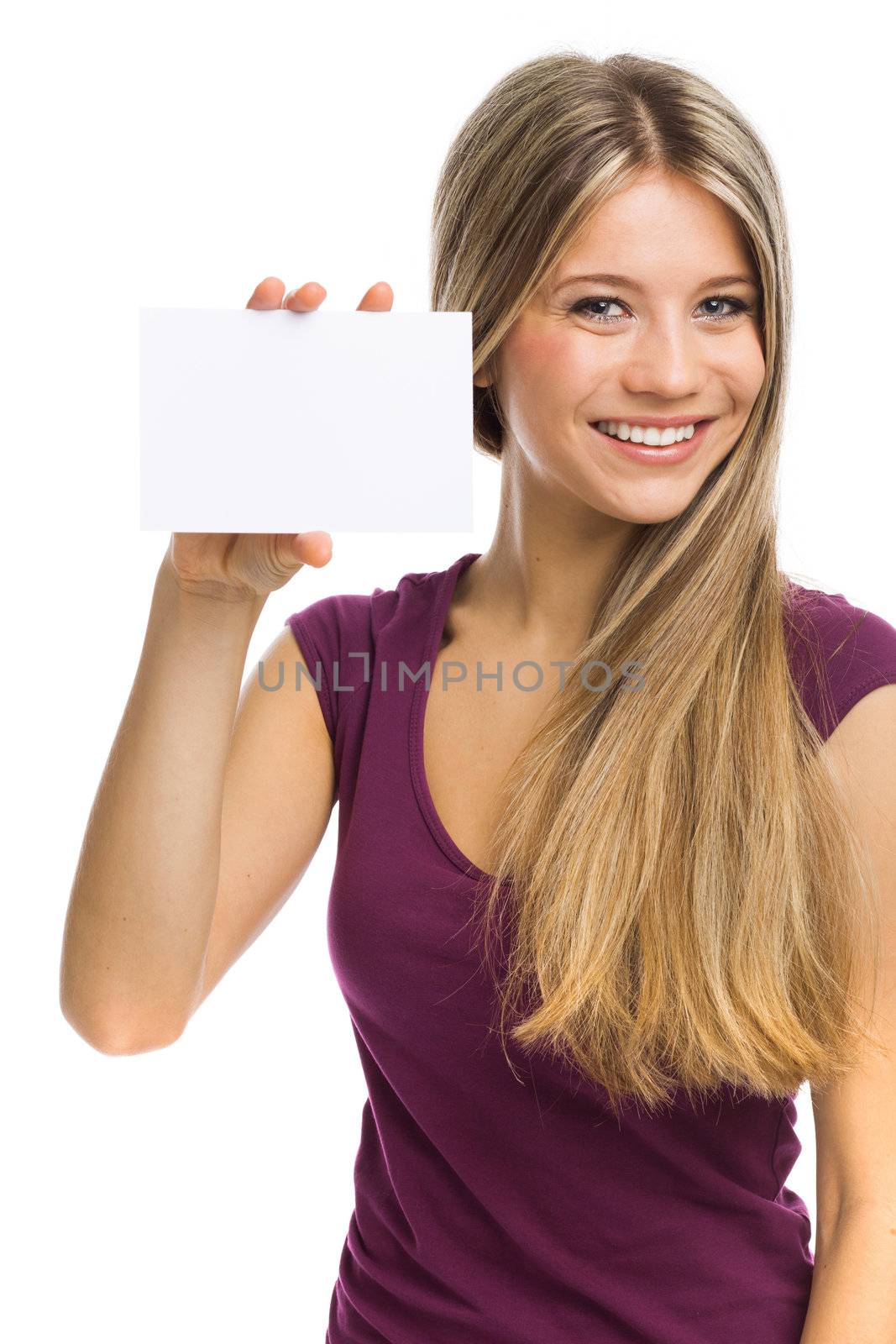 Cute young woman showing a blank signboard, on white