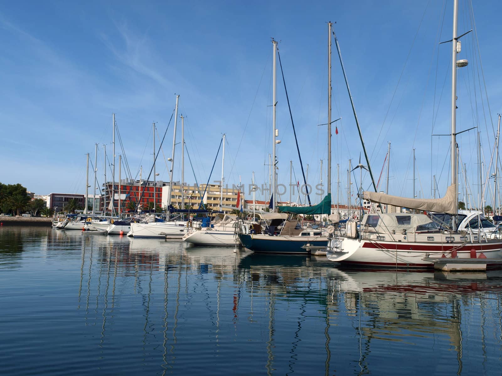 The yacht harbor full of beautiful boats on the coast of the Algarve in Portugal