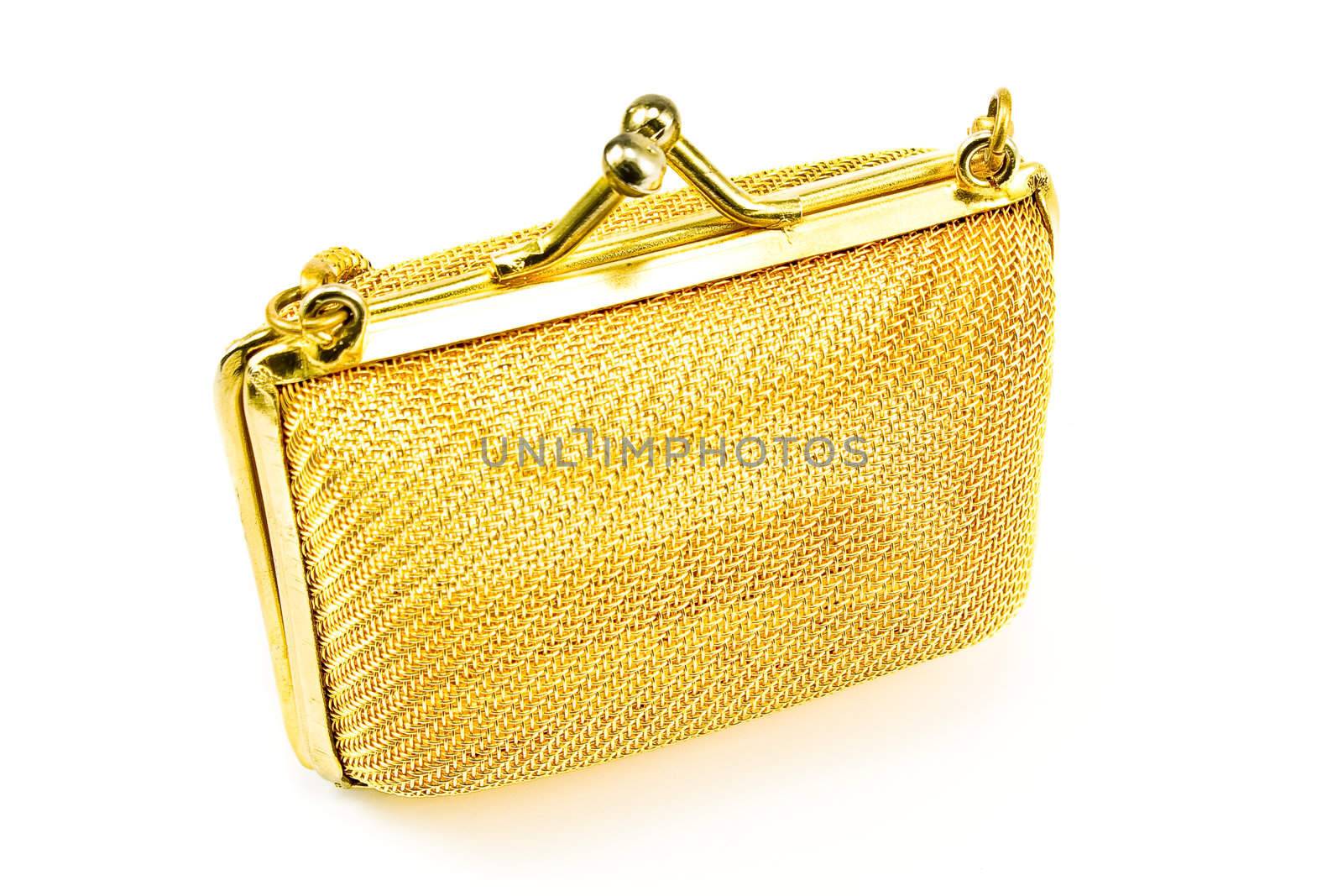 Golden purse isolated on white