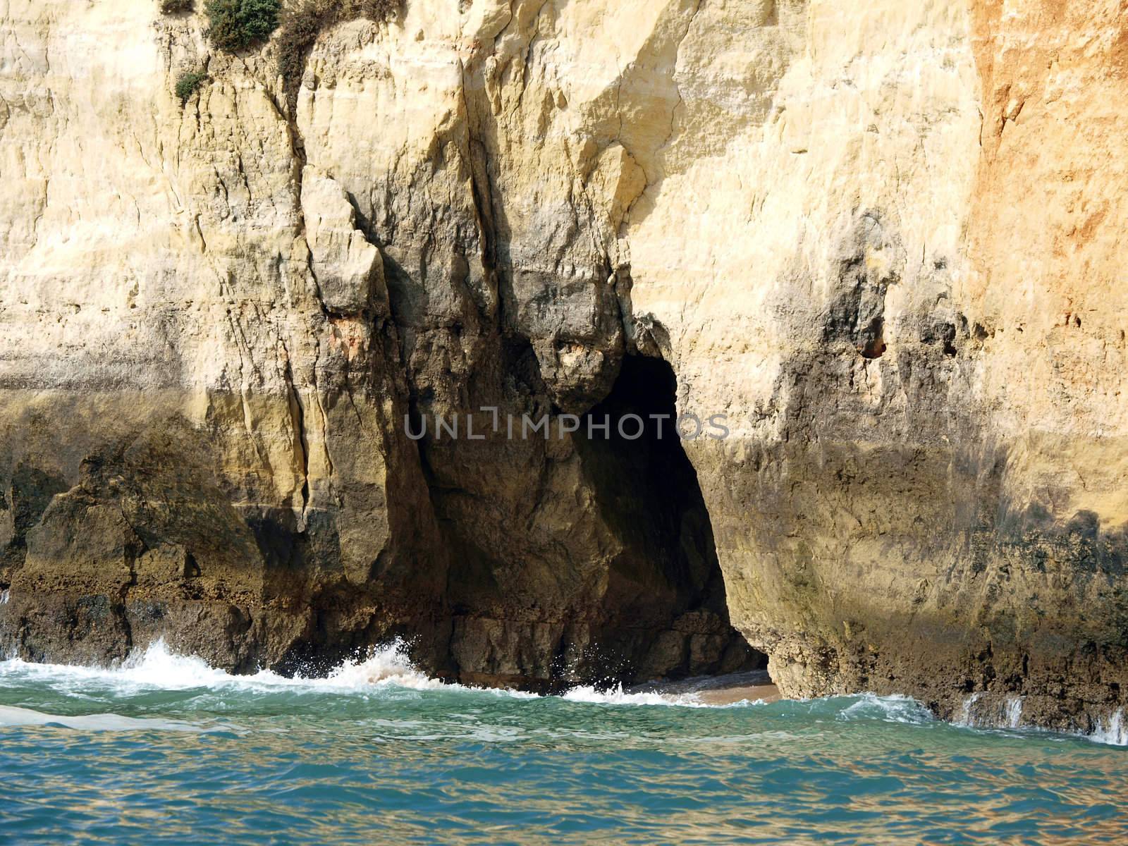 Caves and colourful rock formations on the Algarve coast in Portugal