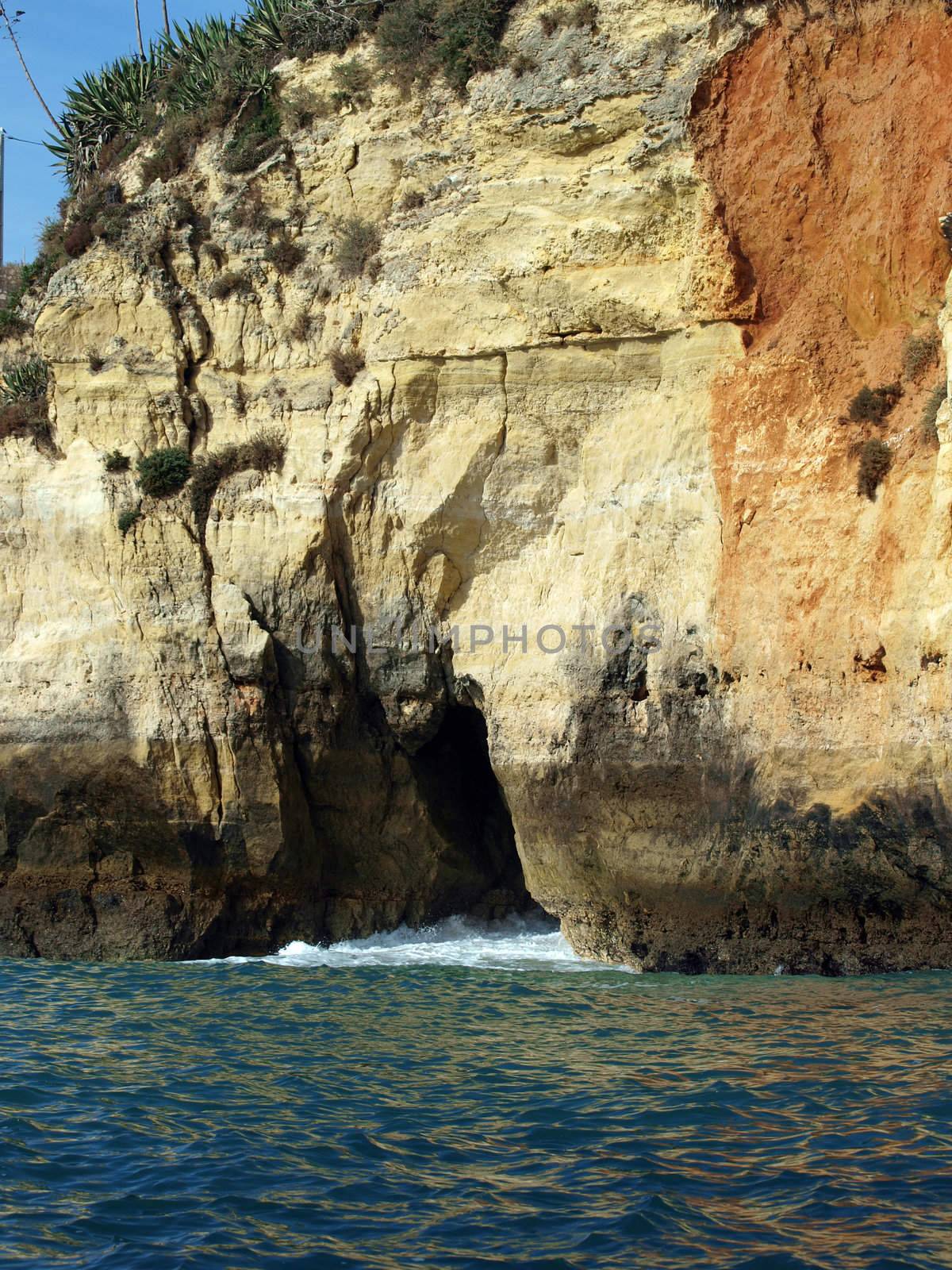 Caves and colourful rock formations on the Algarve coast in Portugal