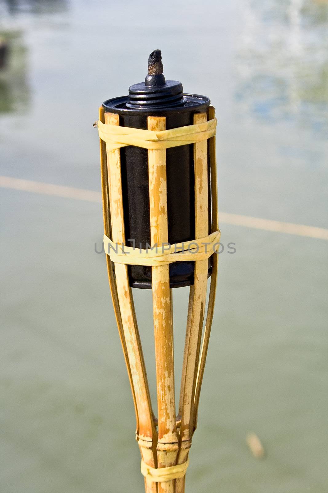 Bamboo torche near water