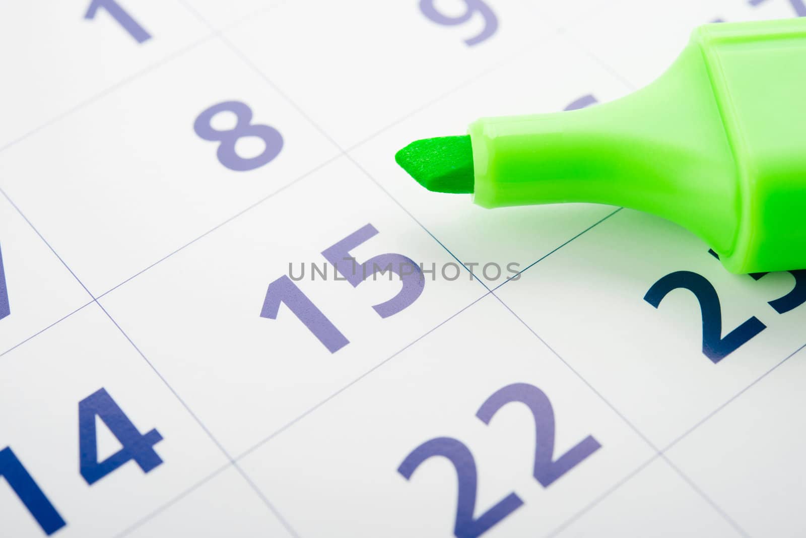 Green marker and open calendar