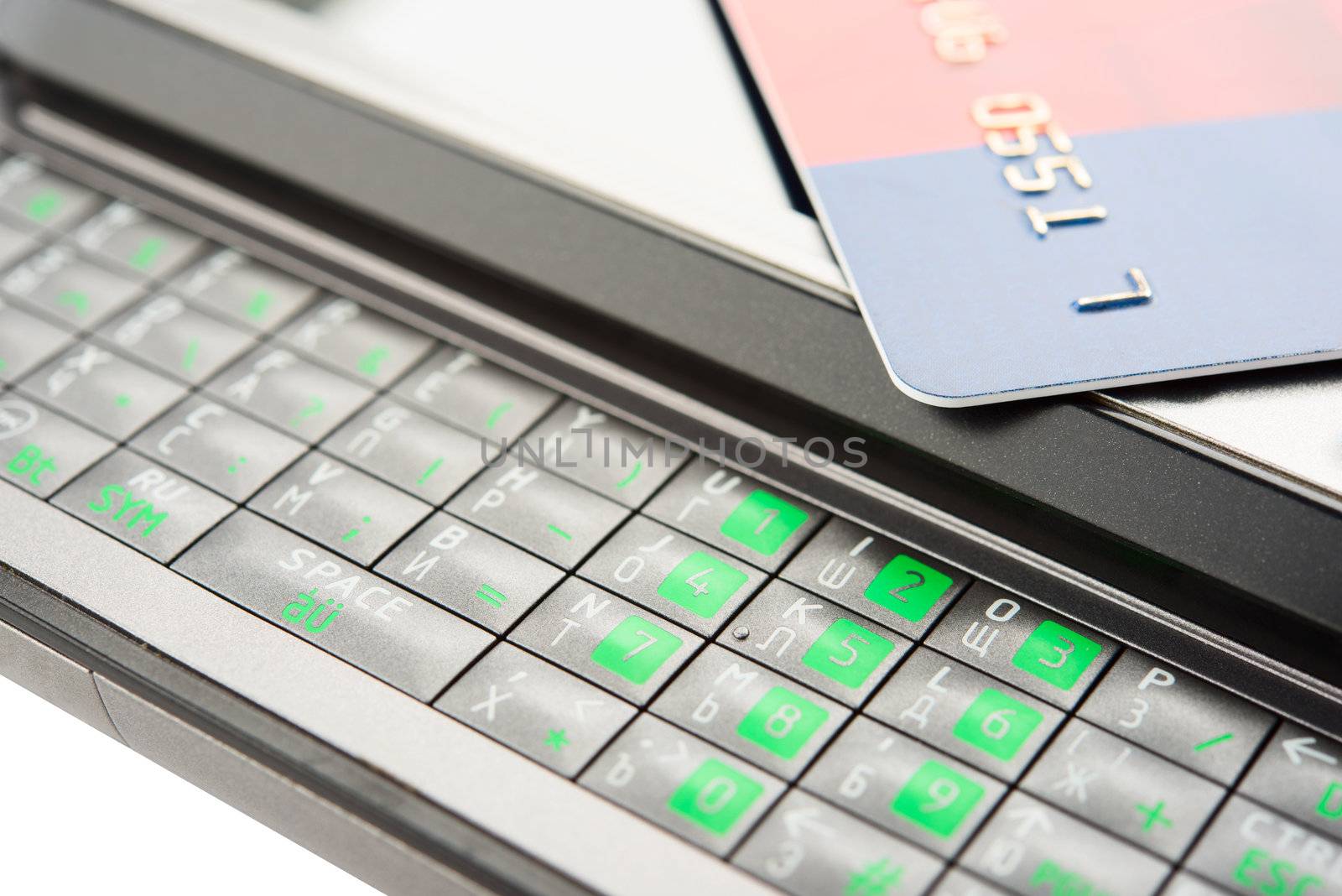 Close view of smartphone with credit card.