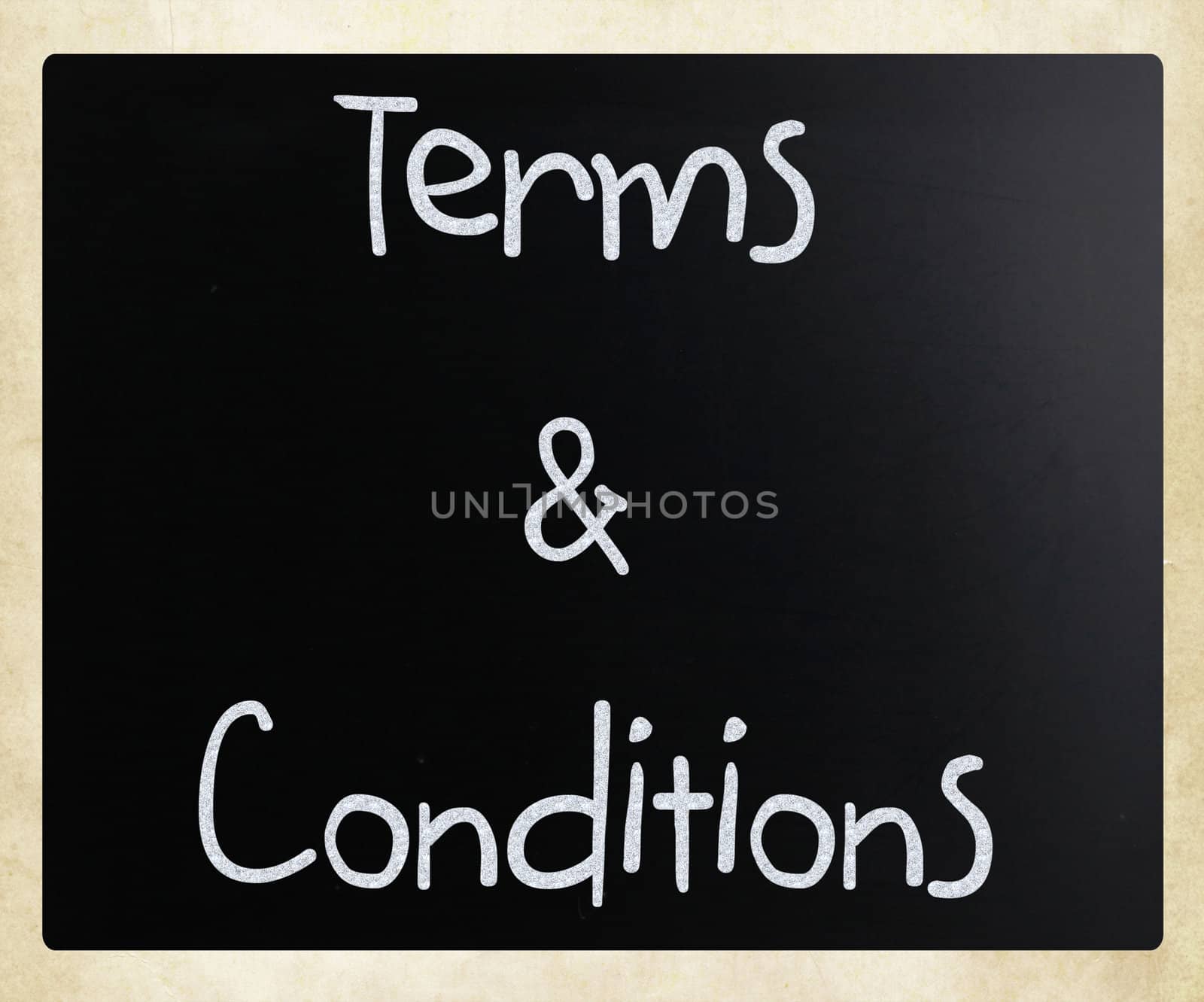 "Terms & Conditions" handwritten with white chalk on a blackboard
