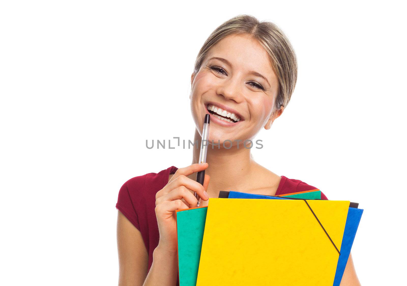 Young smiling woman holding folders, on white