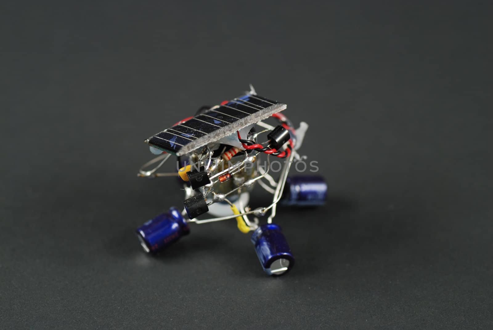 stock pictures of a robot powered by solar energy